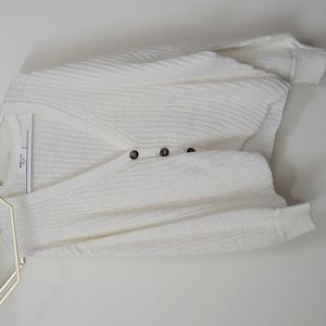 Slightly cropped button up sweater
